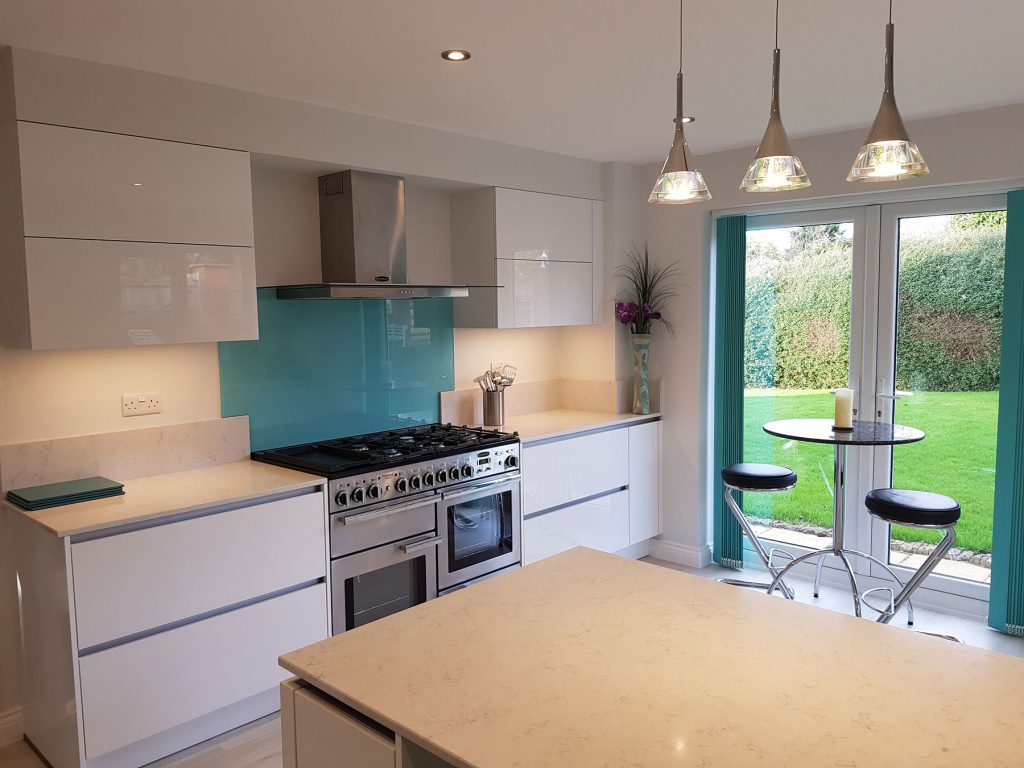 A beautiful white gloss 'true handleless' kitchen completed for our clients in Exton