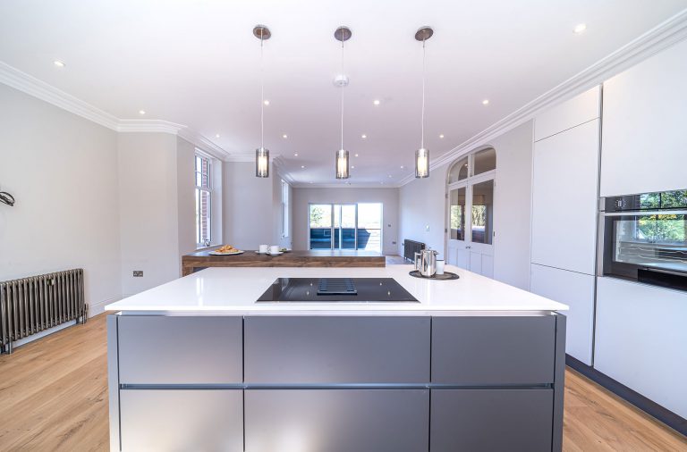 Nobilia contemporary kitchen was designed with white handleless cabinets